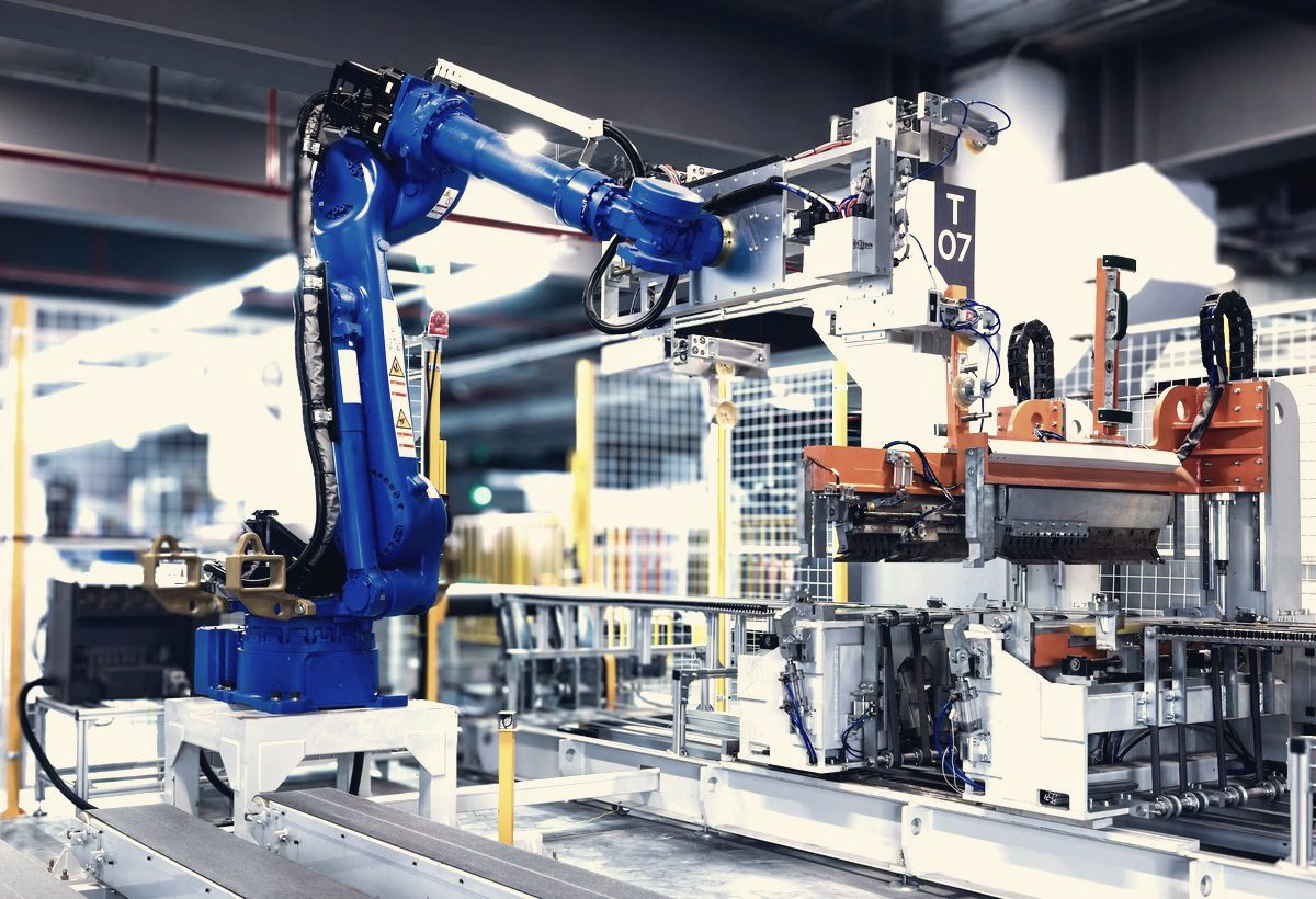 Robotic arm on an automated metal fabrication line